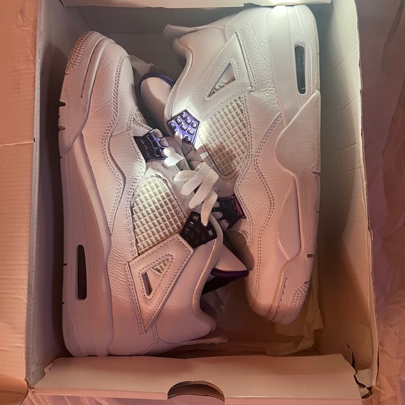 Metallic purple and white Jordan 4s